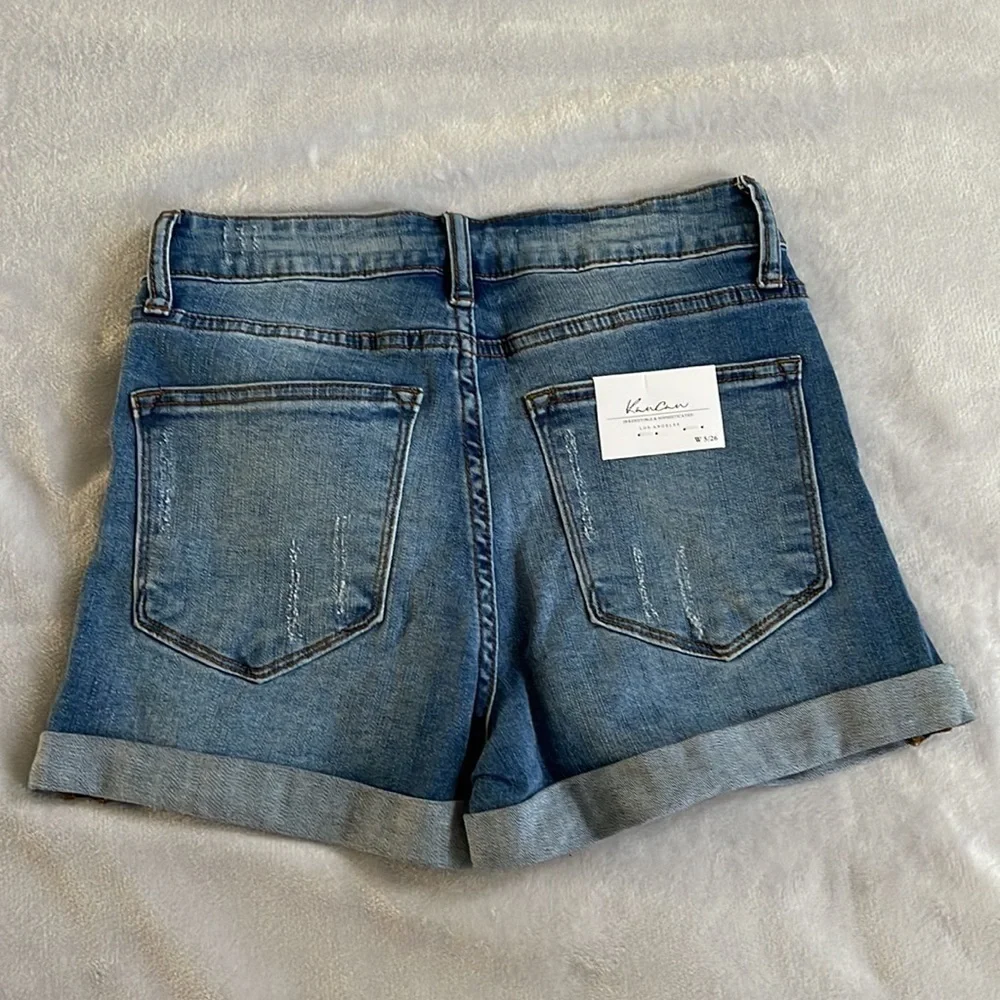Kancan mid rise medium wash distressed five pocket size 5 size 26 jean shorts